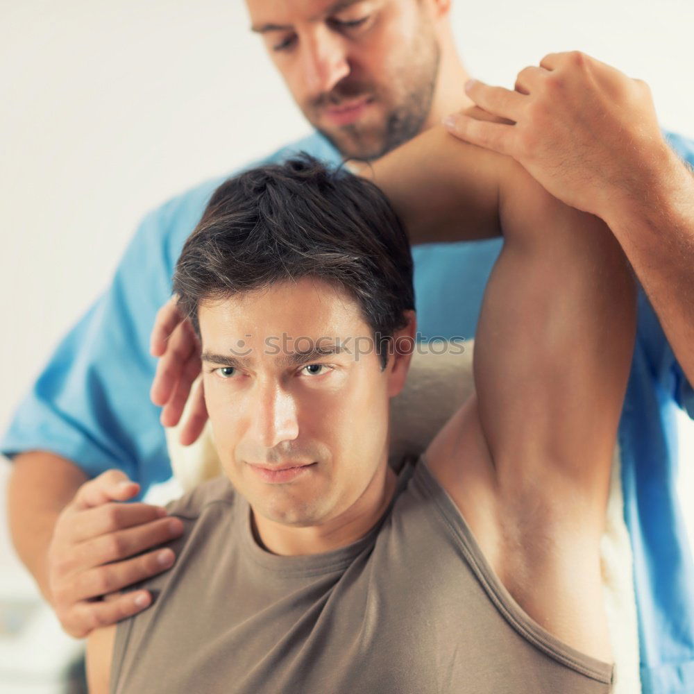 Image, Stock Photo young man at the physio therapy with pain
