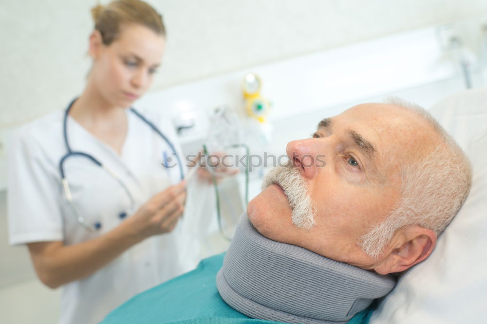 Similar – Doctor holding syringe with vaccine and making injection to senior patient. Covid-19 or coronavirus vaccine