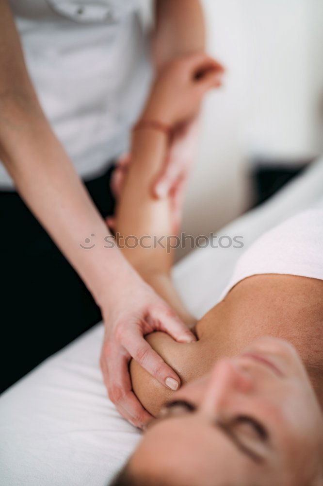 Similar – Image, Stock Photo Woman receiving back massage on clinical center