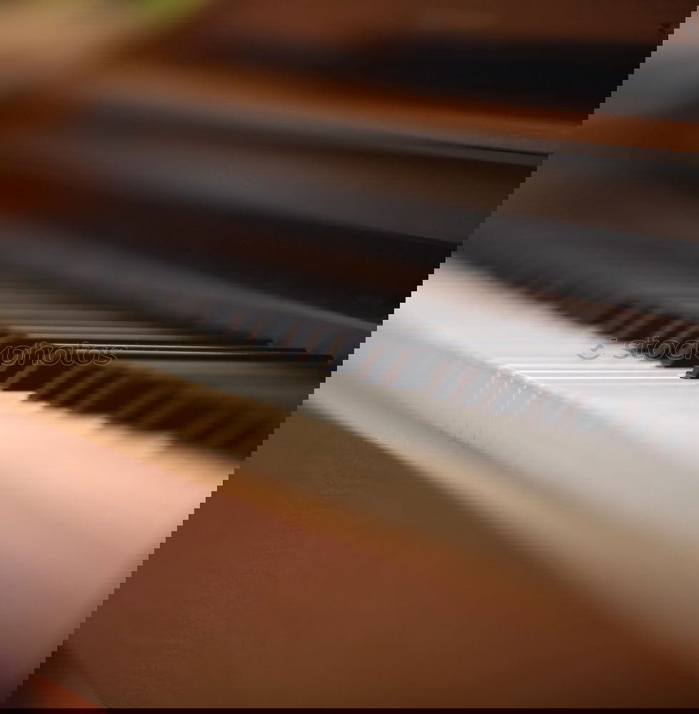 Similar – Image, Stock Photo Close up of the keys of an old worn piano.