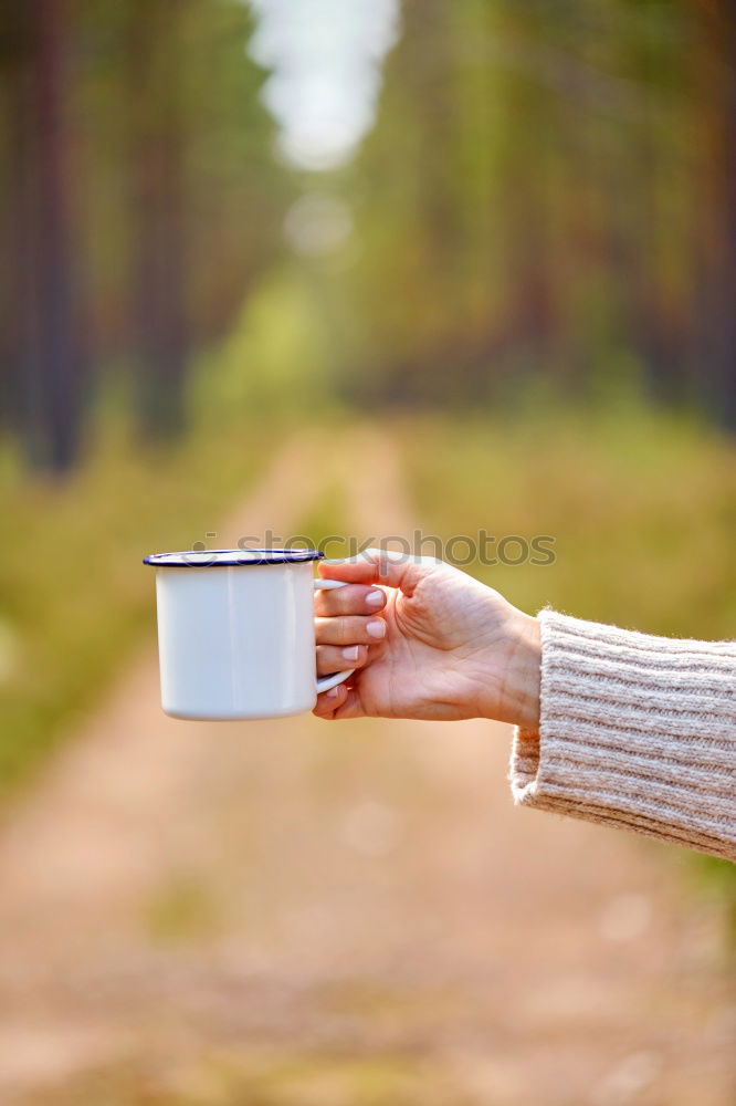 Image, Stock Photo Turquoise coffee mug held by hands of young woman in yellow pigtail sweater