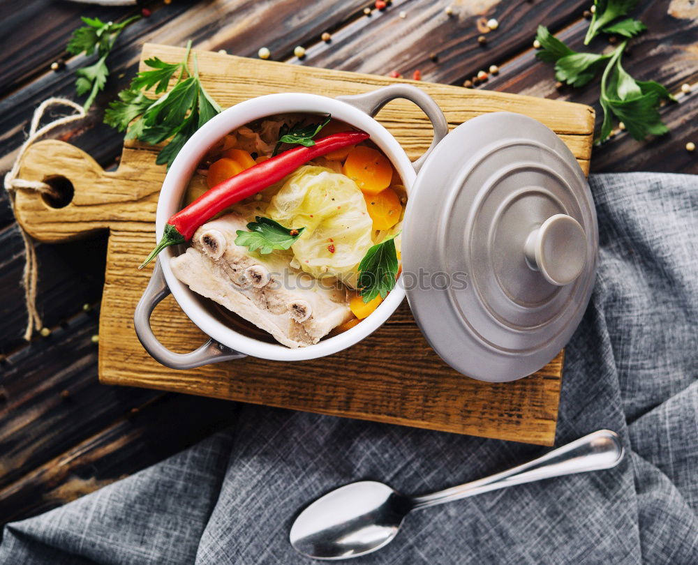 Geometric bowl of Asian Noodle Soup with chopsticks