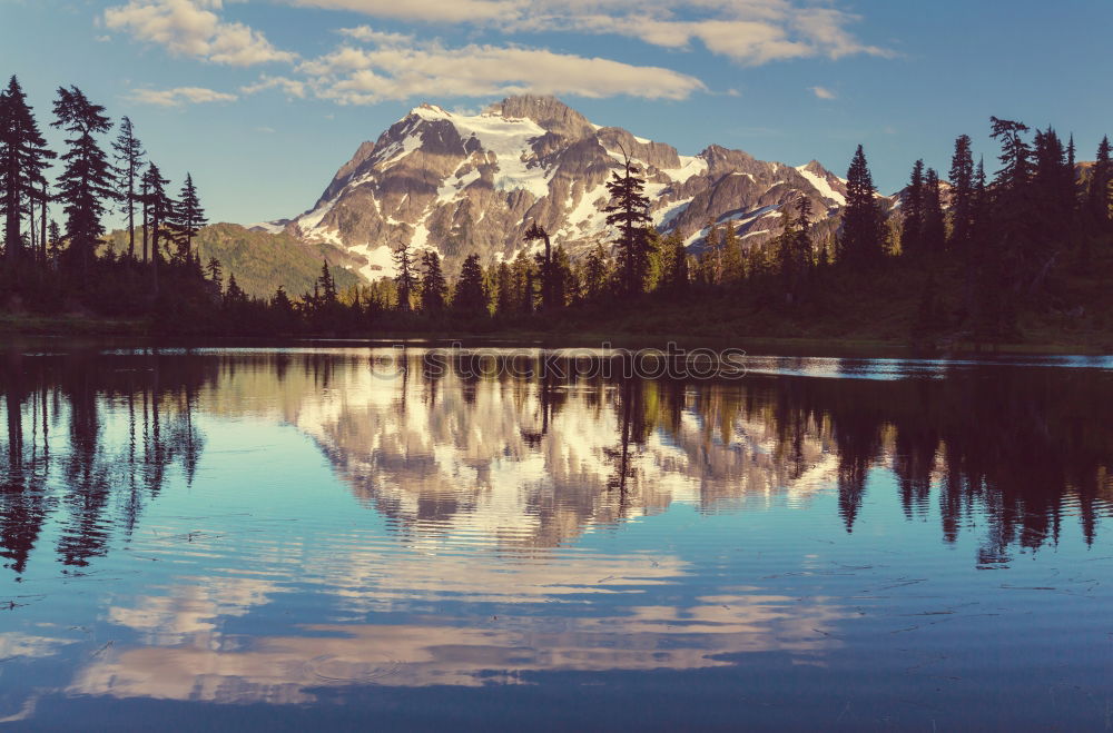 Similar – Mountain hut at Oeschinensee with intensive blue reflection