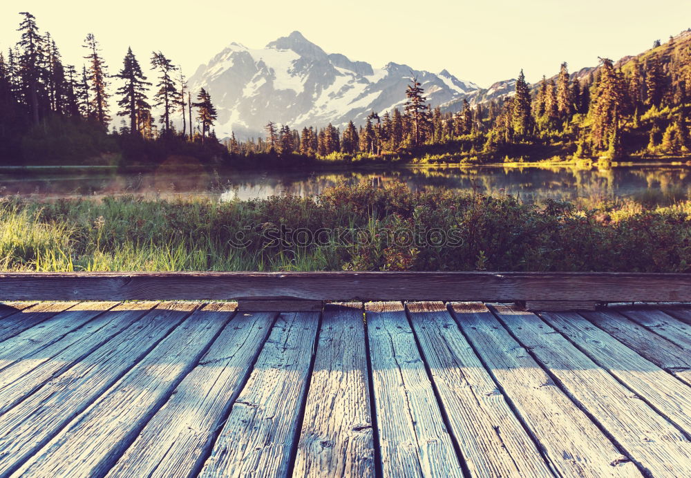 Similar – Pier on mountain lake Lake