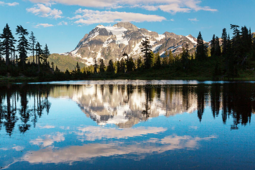 Similar – Mountain hut at Oeschinensee with intensive blue reflection