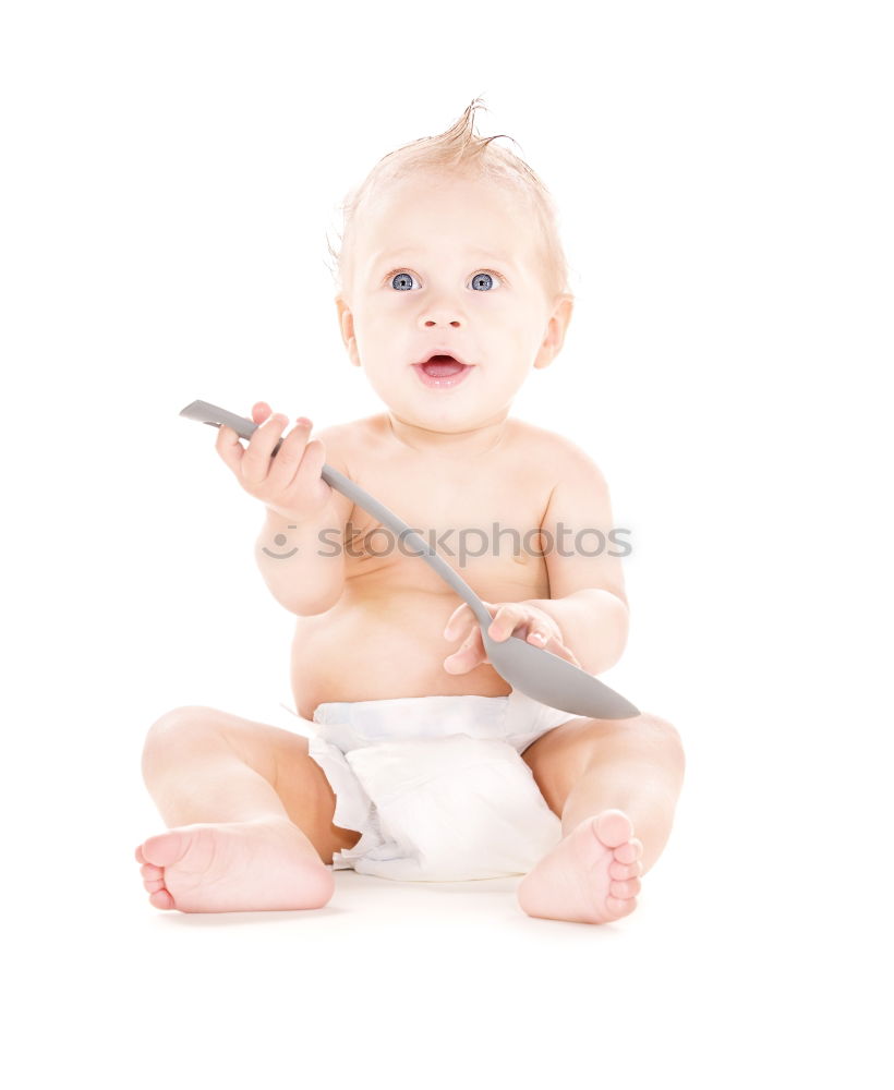 Similar – Image, Stock Photo A cute little girl in chef’s hat sitting on the kitchen floor soiled with flour, playing with food, making a mess and having fun