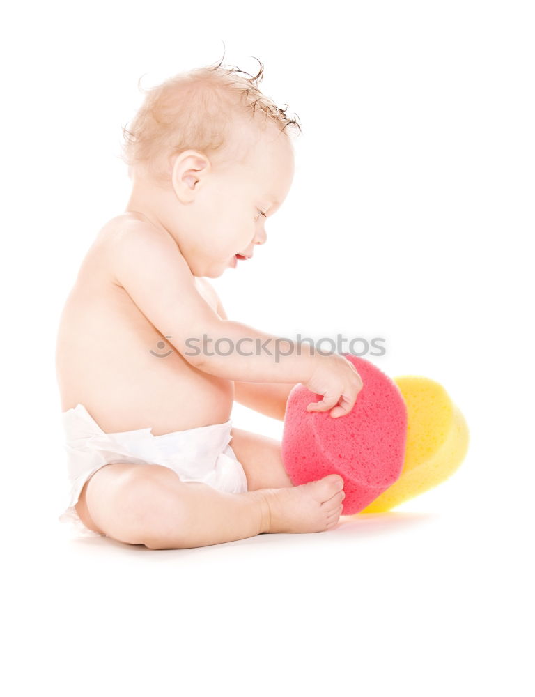 Similar – Baby girl in a bed with toys around.