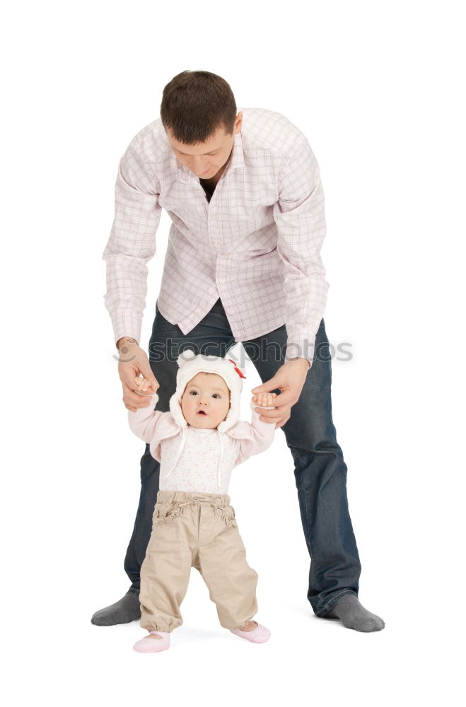 Similar – sad son hugging his dad near wall at the day time