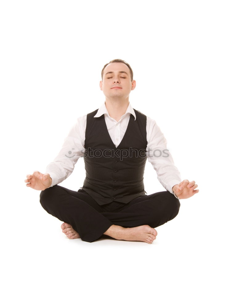 Similar – Anonymous man meditating during yoga training