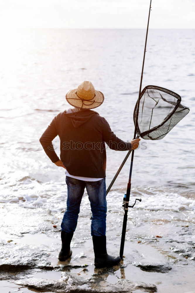 Similar – Man on fishing with rod