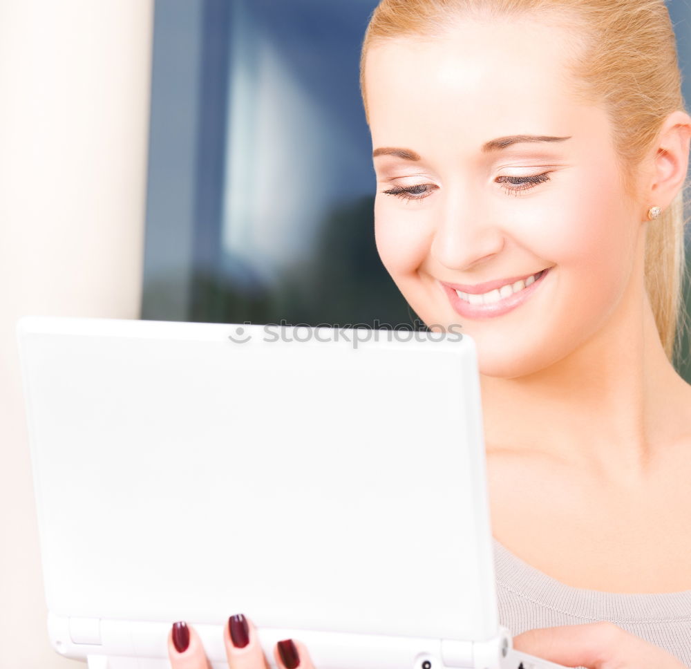 Similar – Young asian woman smiling and using tablet