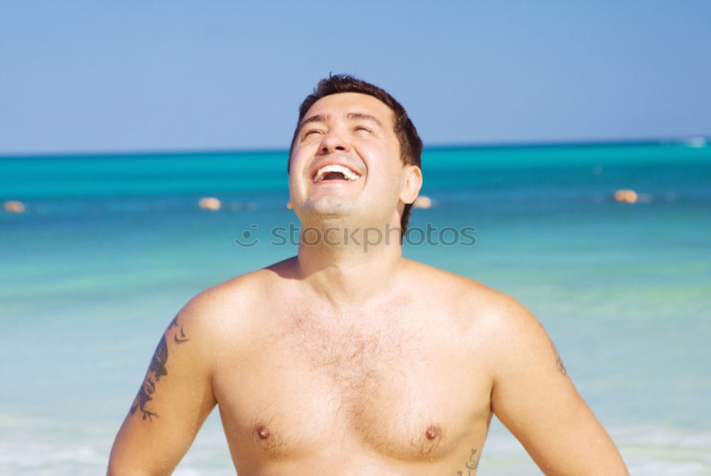 Similar – Young handsome man posing near a pool