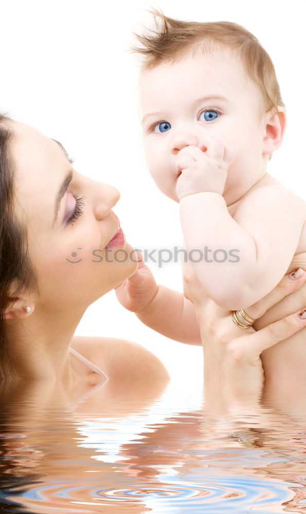 Similar – Teenage girl with her little sister spending time together in the swimming pool in a garden enjoy eating ice cream on a summer sunny day. Family quality time