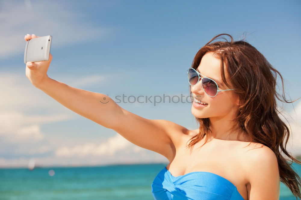 Similar – Image, Stock Photo Two girls taking selfie photograph with smart phone