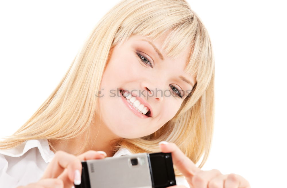 Similar – Young blonde girl with her mobile phone