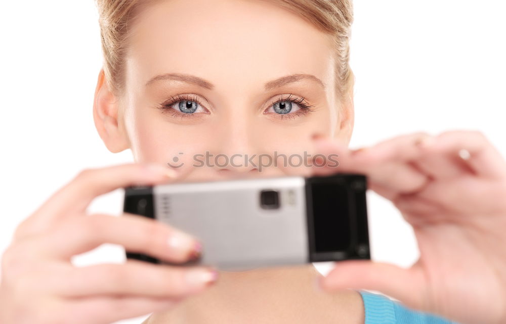 Similar – Image, Stock Photo Teen holds cell phone in front of mouth with picture of his mouth