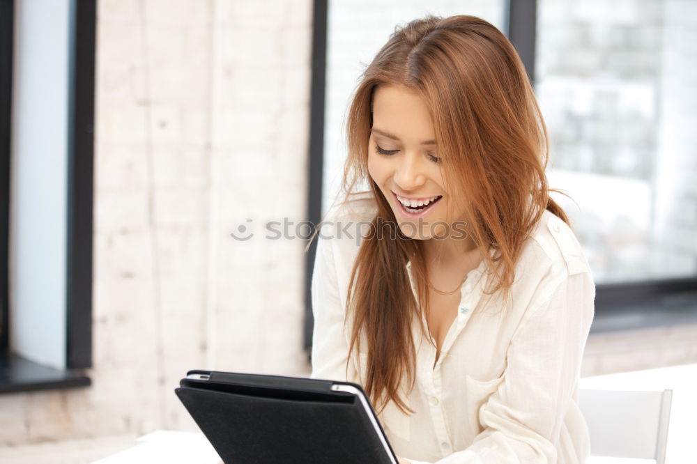 Similar – Image, Stock Photo Smiling African woman using digital tablet outdoors.