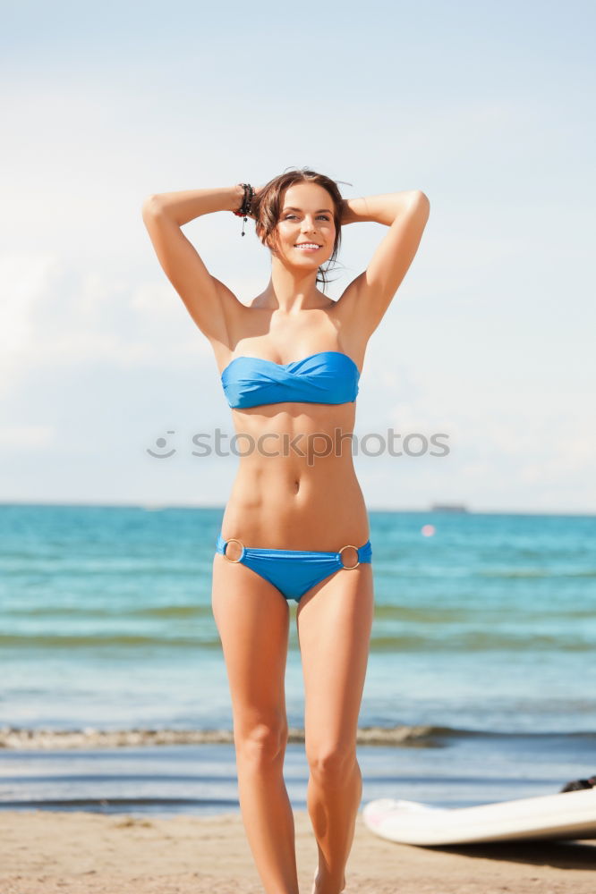 Similar – Image, Stock Photo Woman with beautiful body enjoying her bath on the beach