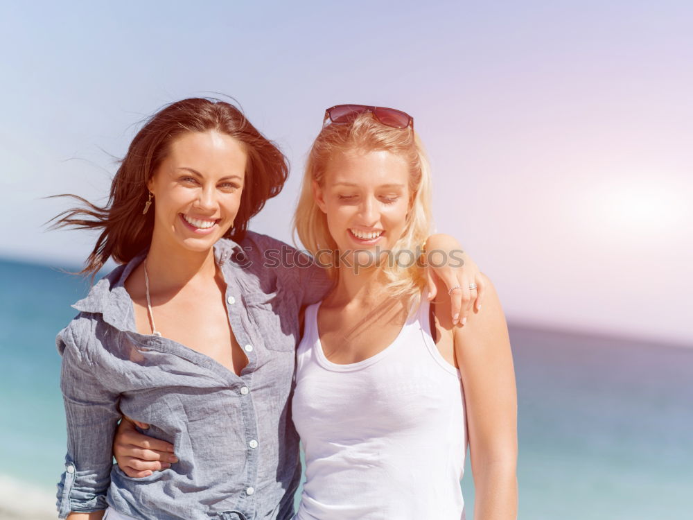 Similar – Image, Stock Photo Two women on the sand of a tropical beach