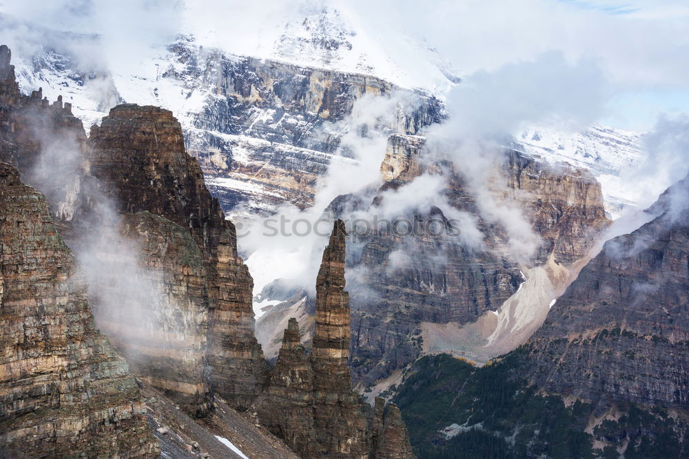 Similar – Tourist standing in mountains