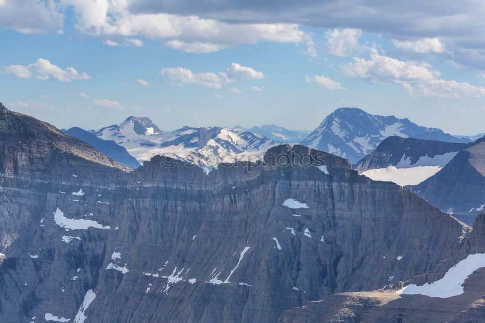 Similar – Tourist standing in mountains