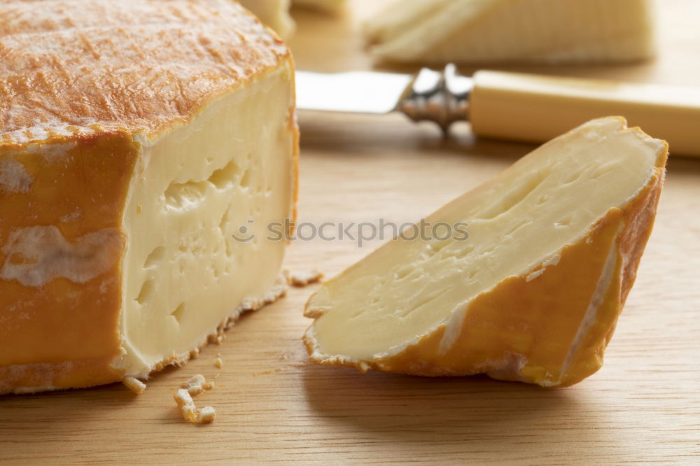 Similar – Image, Stock Photo Semi-cured cheese rosemary sliced on toasted bread