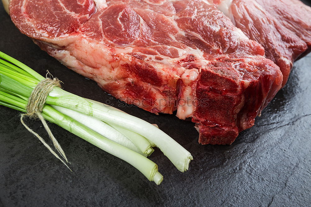 Similar – Image, Stock Photo Prepare steaks with herbs and butter