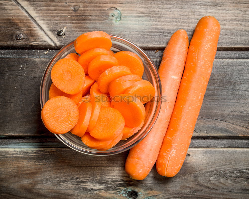 Similar – Image, Stock Photo Two glass jars with fresh carrot juice