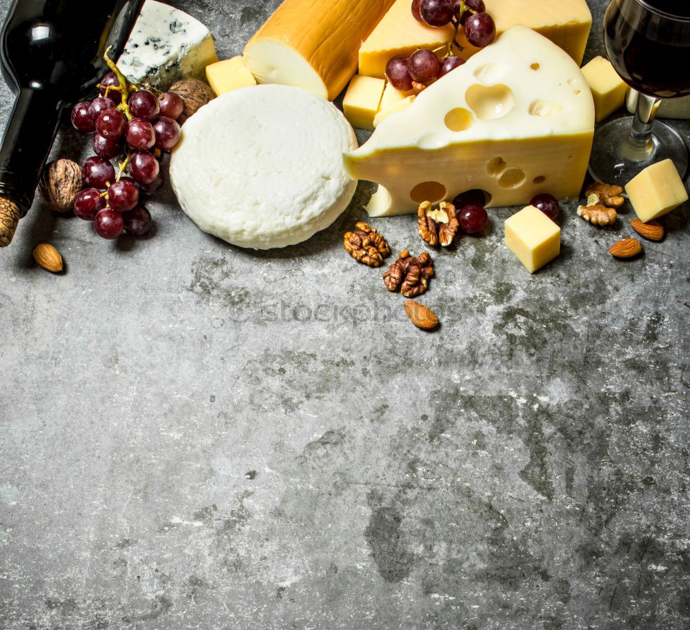 Similar – Image, Stock Photo parmesan cheese on plate of wood