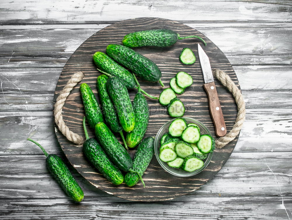 Similar – Pickling cucumbers with home garden vegetables and herbs