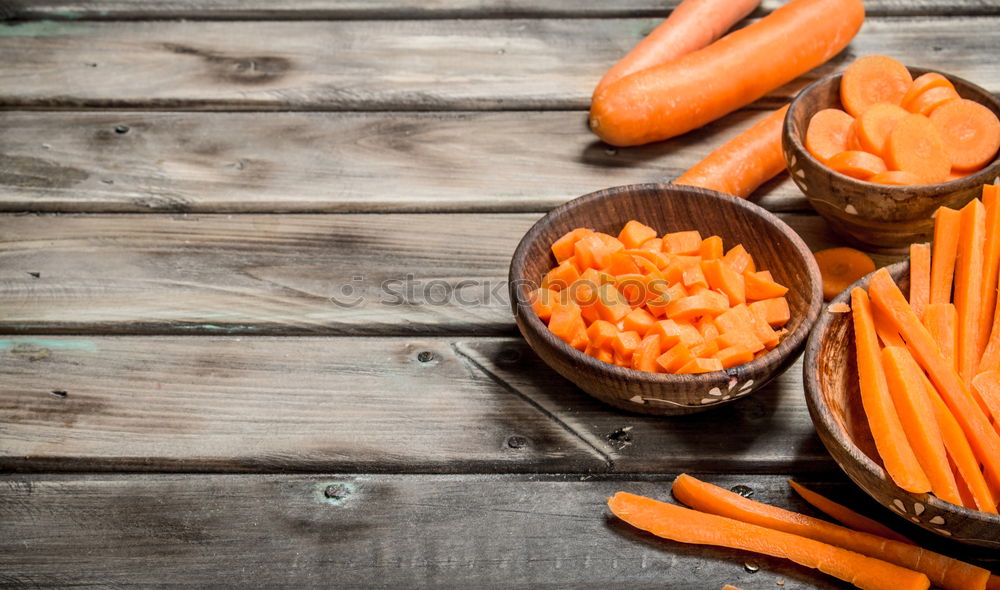 Similar – Large fresh carrots in a female hand