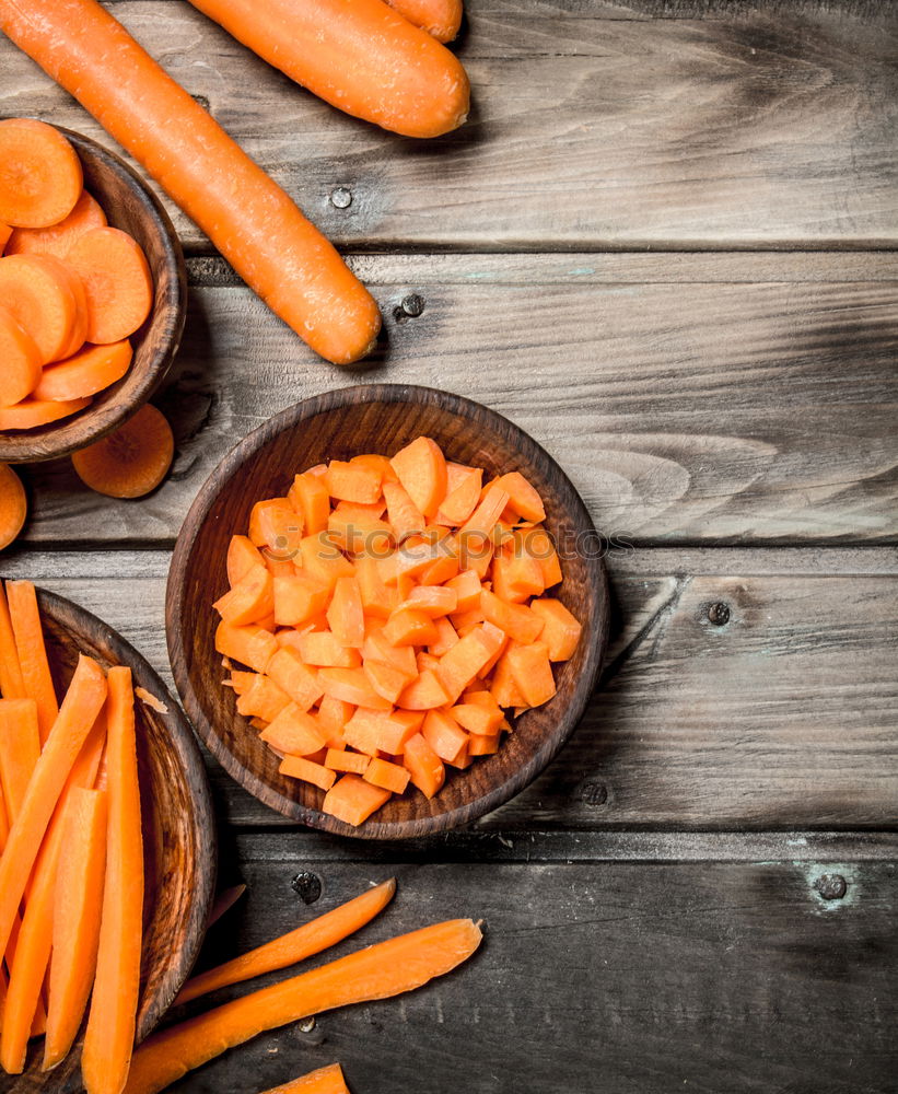 Similar – Large fresh carrots in a female hand