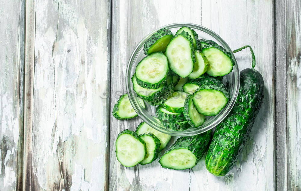 Similar – Image, Stock Photo Pickled cucumbers made with home garden vegetables and herbs