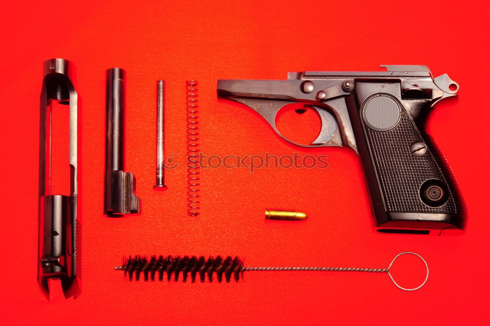 Similar – pistol on pink background