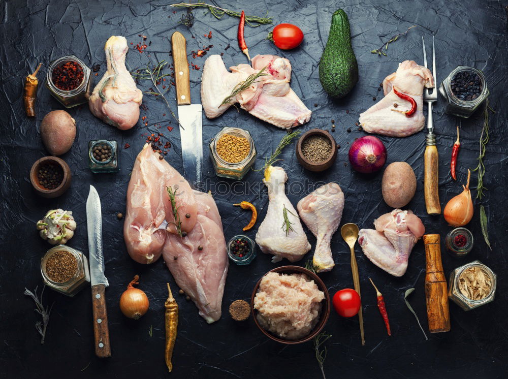 Similar – Image, Stock Photo Whole chicken with oil and vegetables Ingredients for tasty cuisine