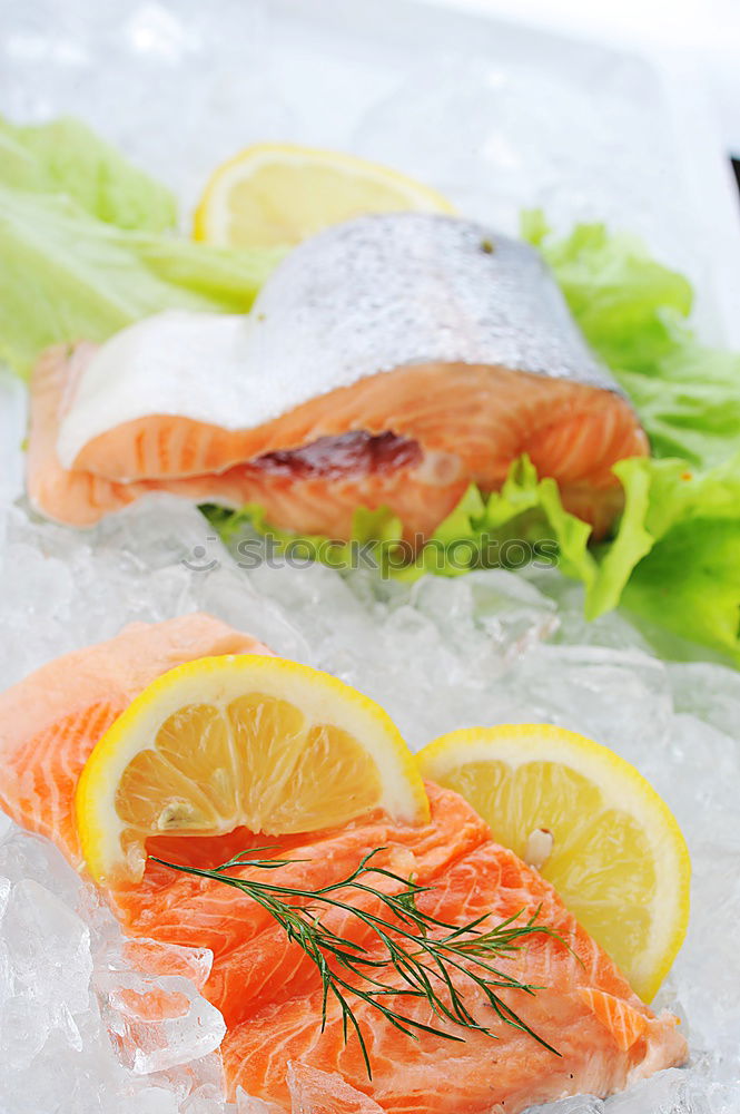 Similar – Image, Stock Photo Salmon fish fillet with lemon on white chopping board