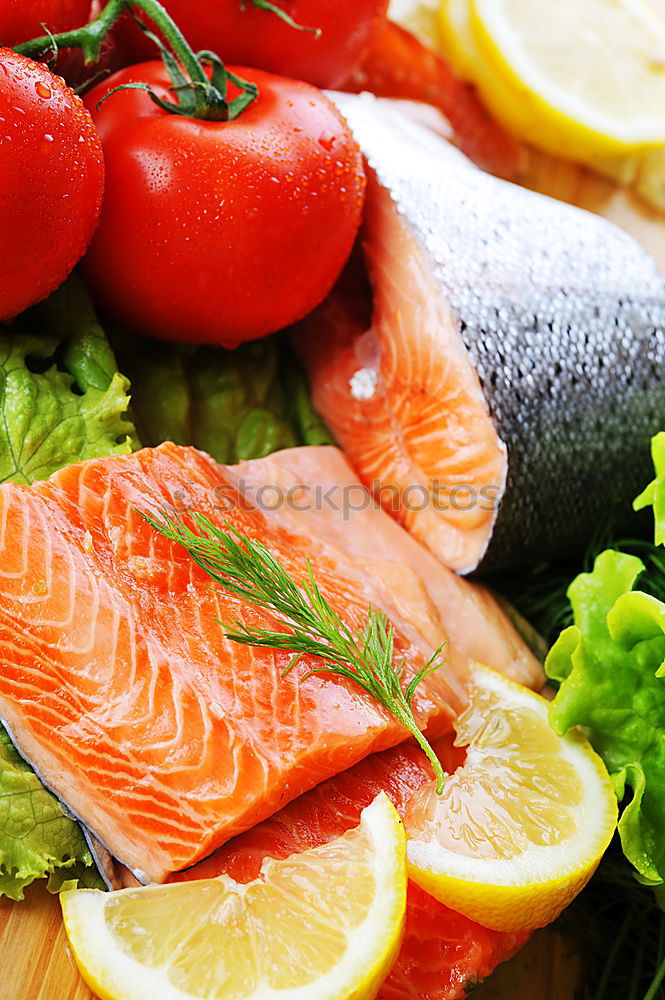 Similar – Image, Stock Photo Salmon steak, preparation with fennel and lemon