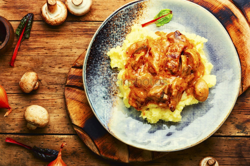 Similar – Image, Stock Photo Spicy Cooking . Frying pan with onion, garlic and chili