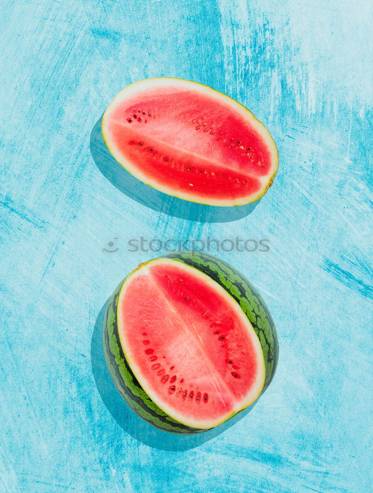 Similar – Pieces of watermelon on background painted in blue