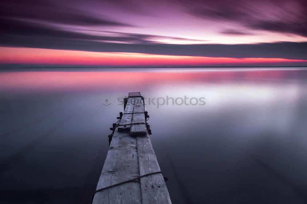 Similar – Image, Stock Photo purple sunrise over North sea beach and lighthouse, Texel