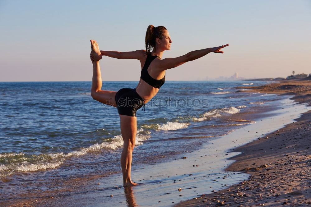 Similar – Image, Stock Photo Black fit woman doing fitness acrobatics in the street