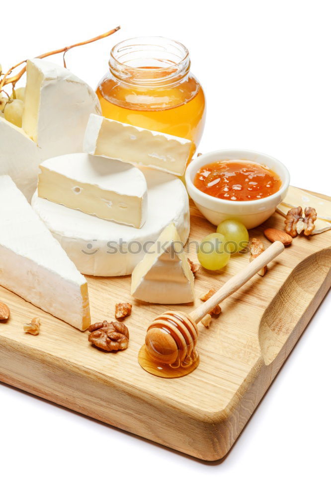 Similar – Image, Stock Photo Cheese sorts with fig mustard sauce and spoon