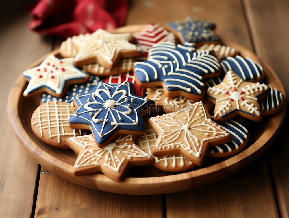 Similar – Cooking Christmas cookies with cookie cutters on a dark table