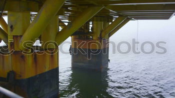 Similar – Way into the sea Jetty