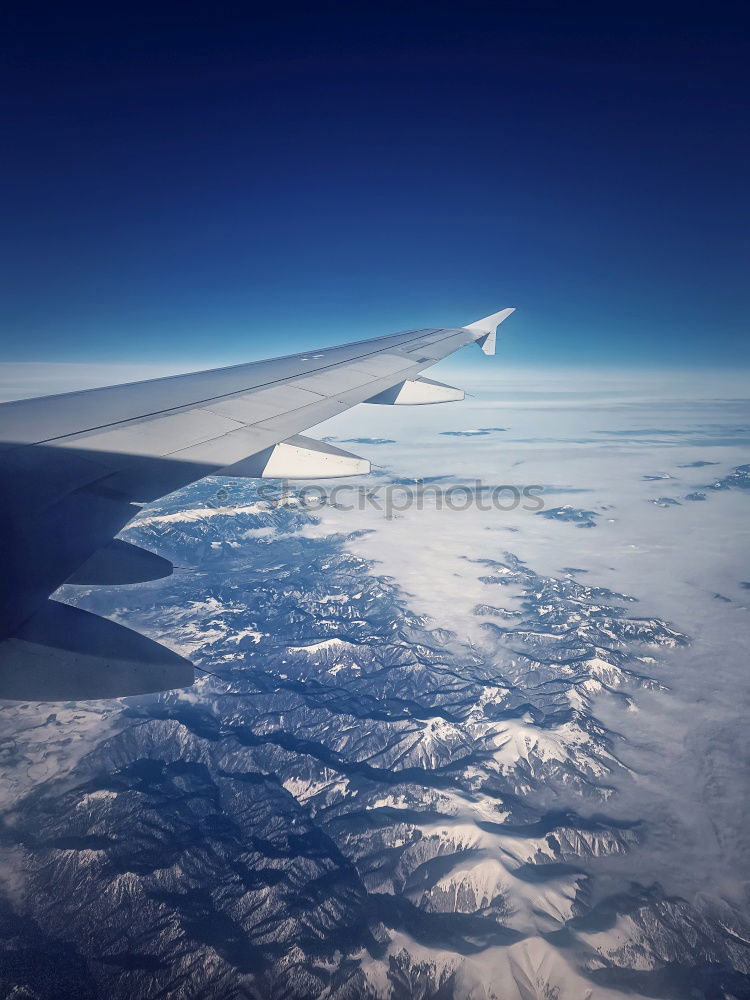 Similar – Above the clouds* Airplane