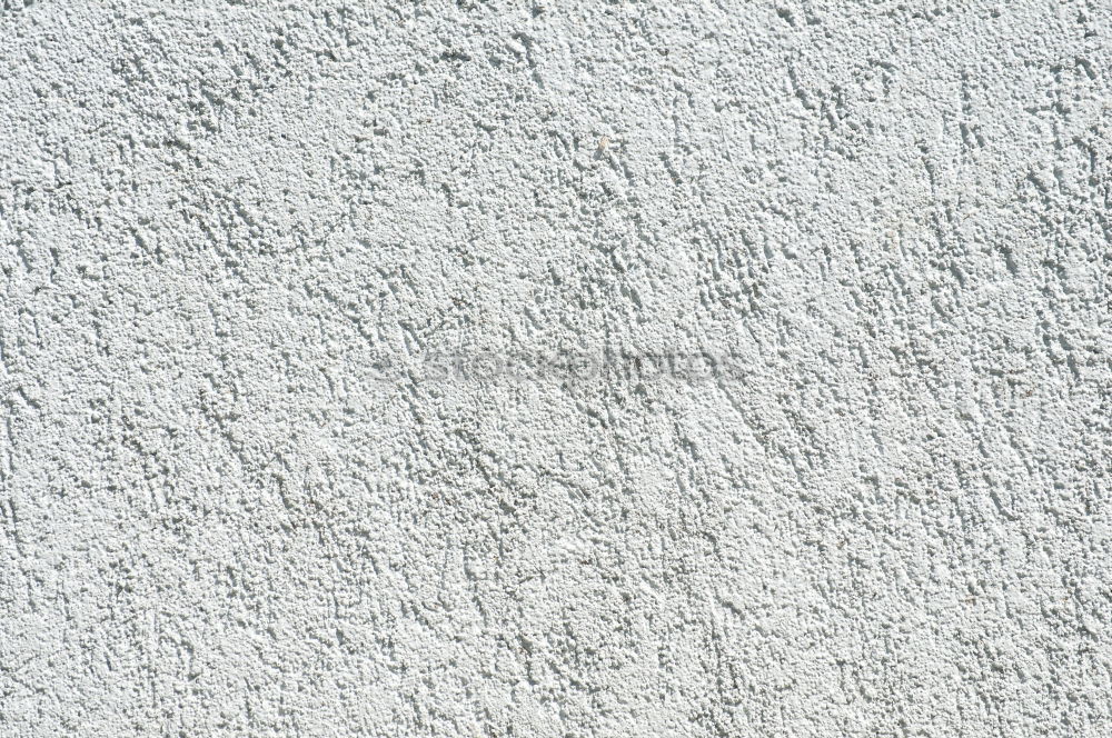 Similar – A piece of white adhesive tape over a crack in the plaster of a house wall