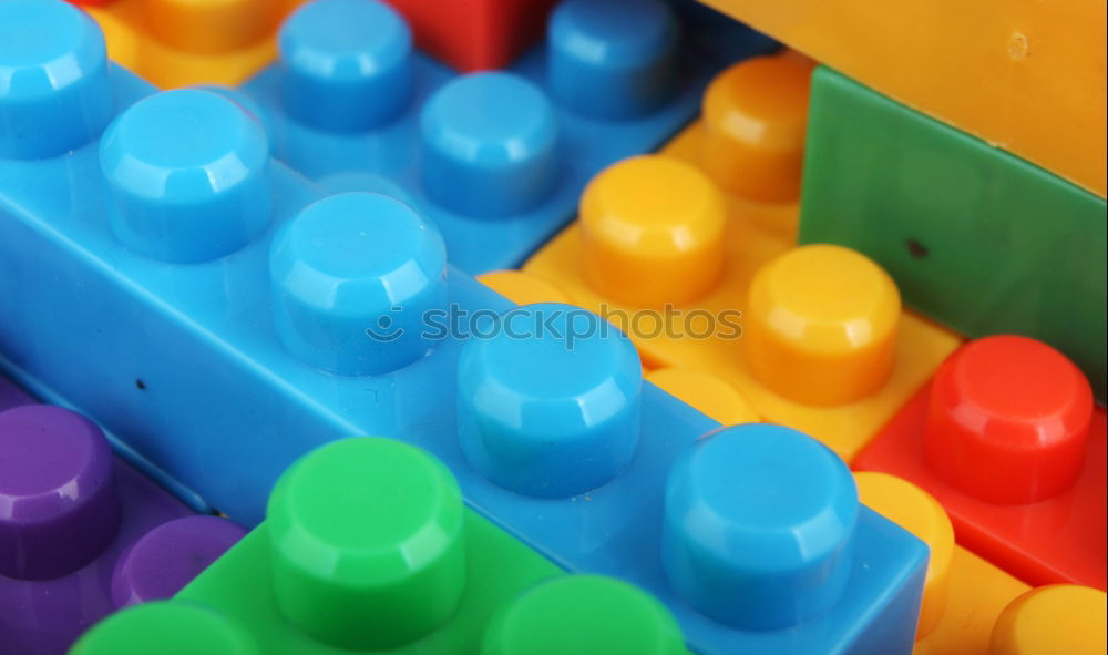 Similar – Image, Stock Photo Blue background with childrens plastic toys