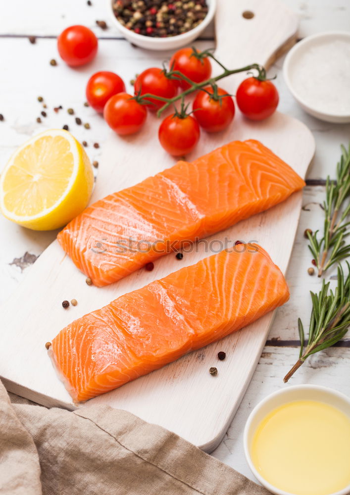 Similar – Image, Stock Photo Salmon fillet on cutting board with knife