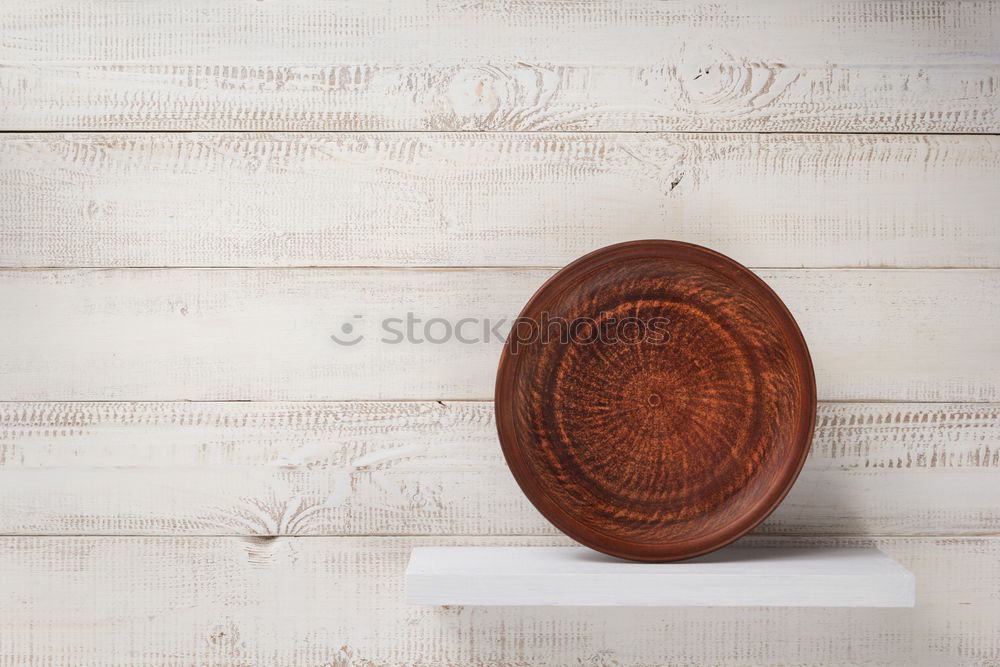 Similar – set of rustic cutting boards and ceramic brown vase