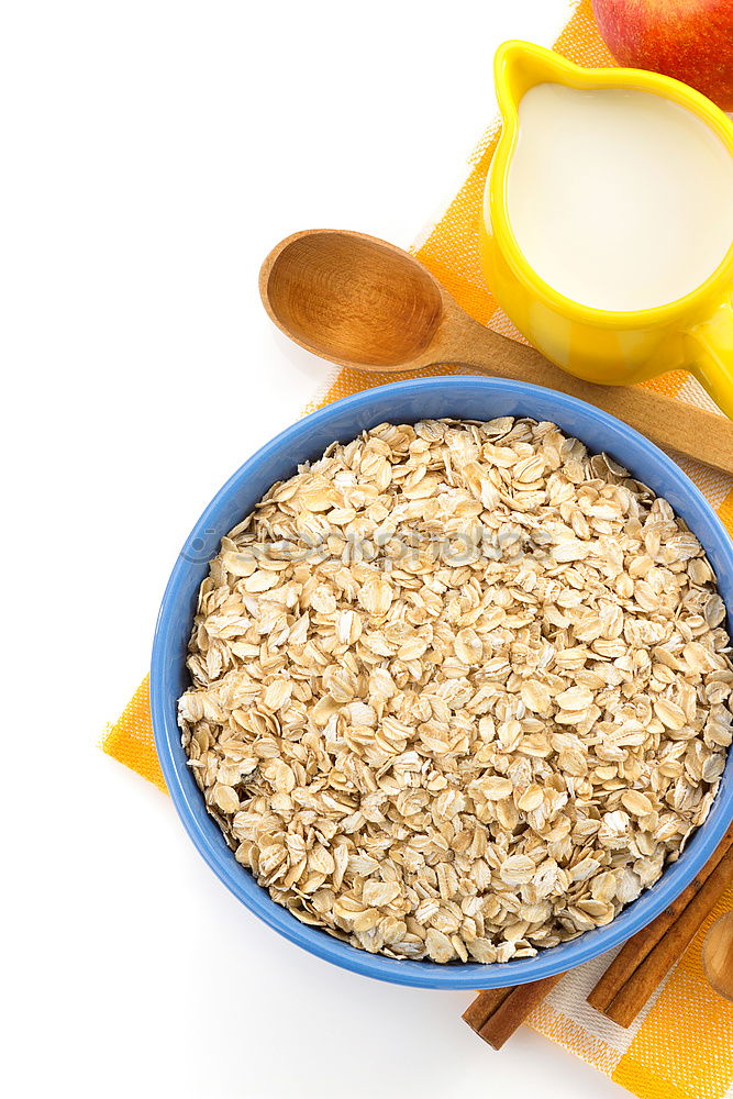 Similar – Oat flakes in blue bowl with berries